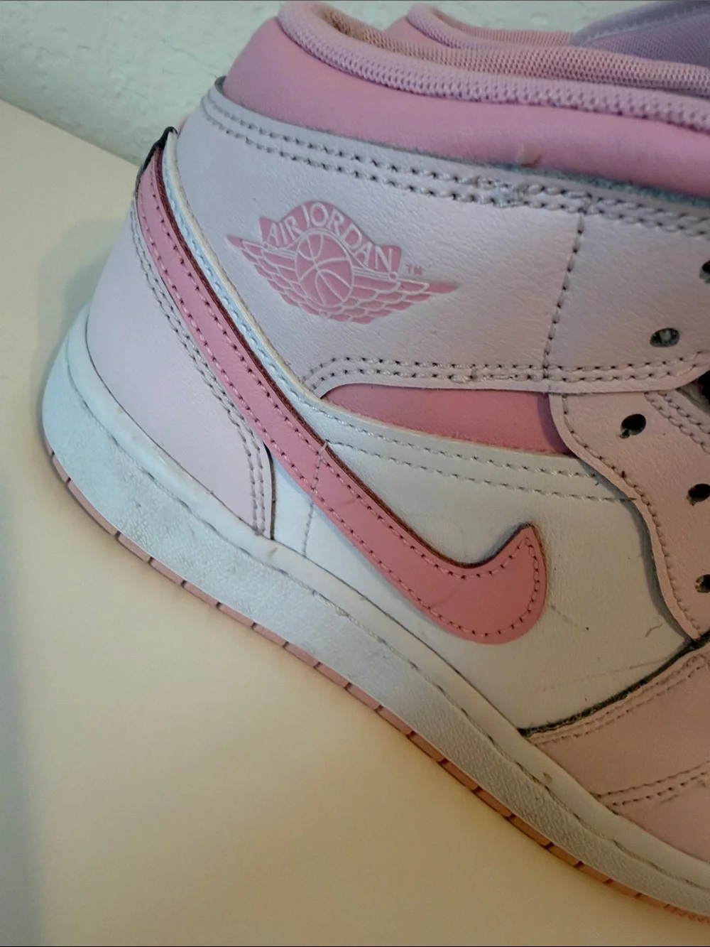 Nike Air Jordan Kids Pink and White High-Top Sneakers with Pink Swoosh